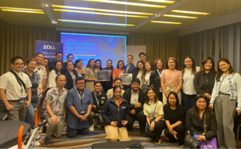 Team posing at awards summit