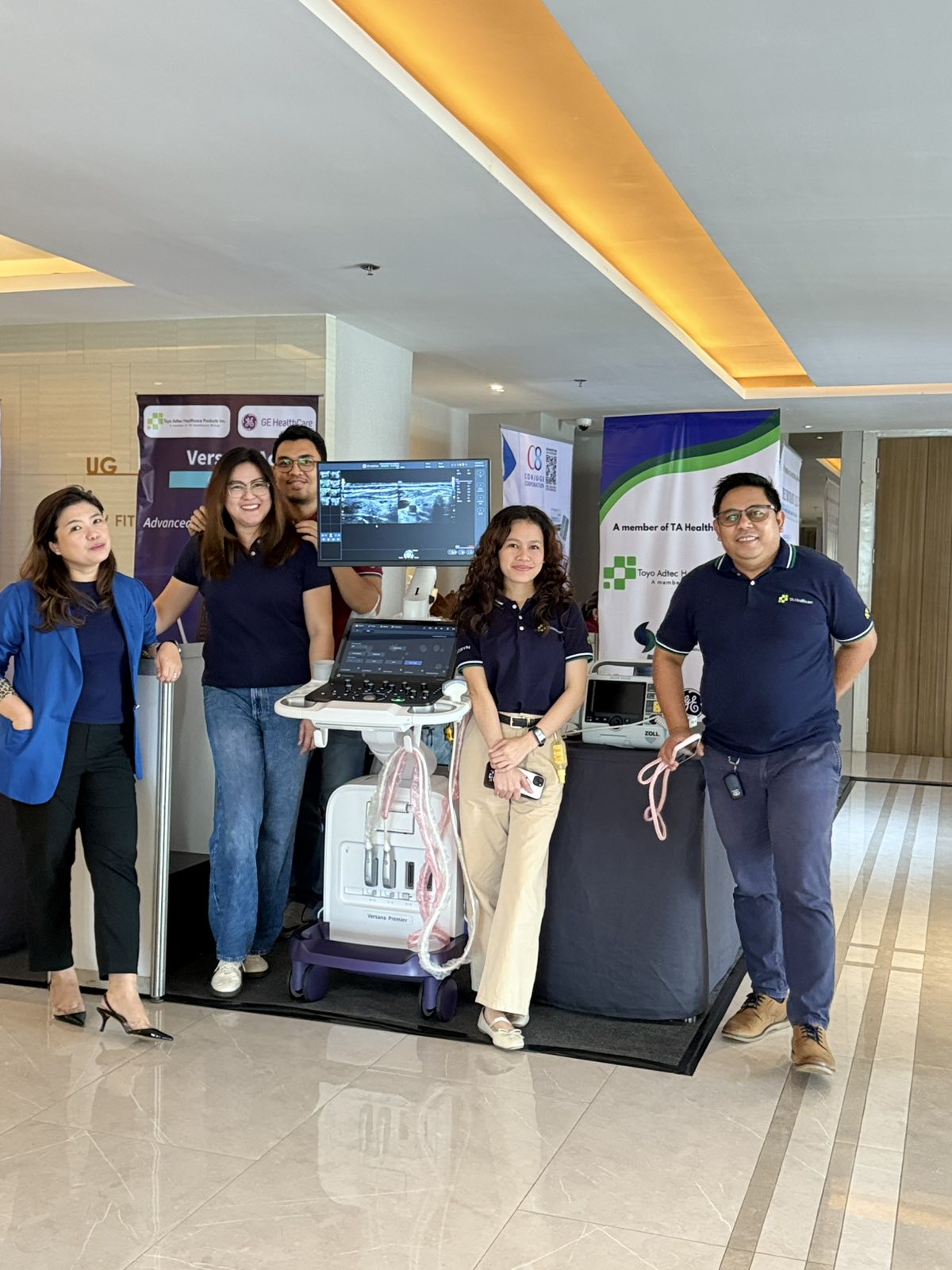 Employees at exhibition booth